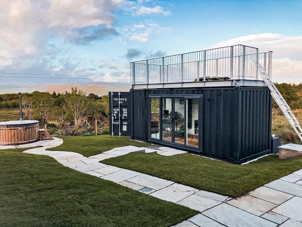 Outdoor Garden Room Made from Recycled Shipping Container